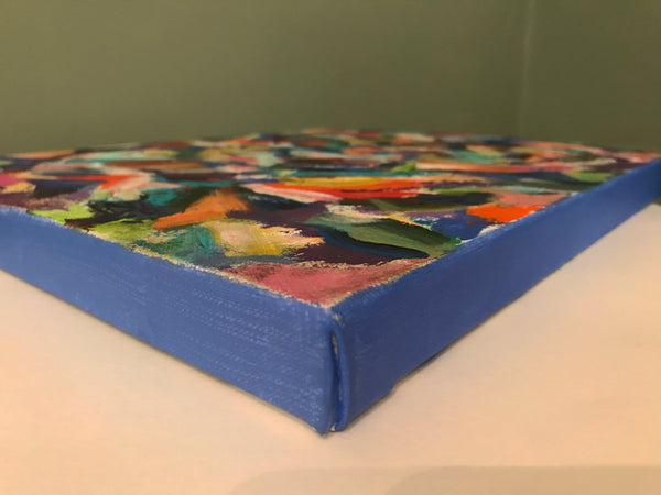 Edges painted with blues to match the painting.